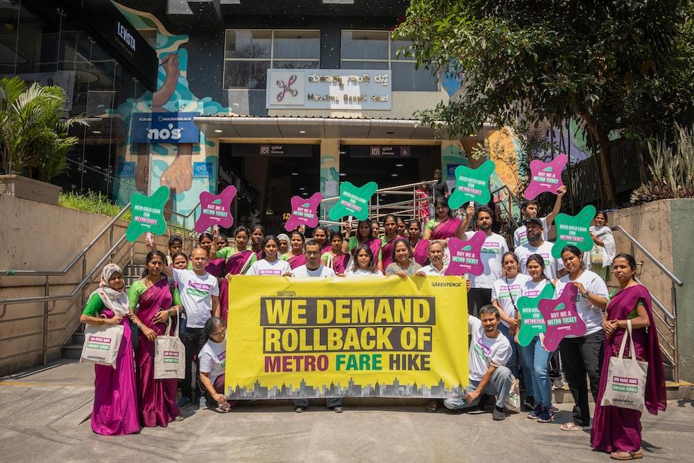 Greenpeace activists outside metro 