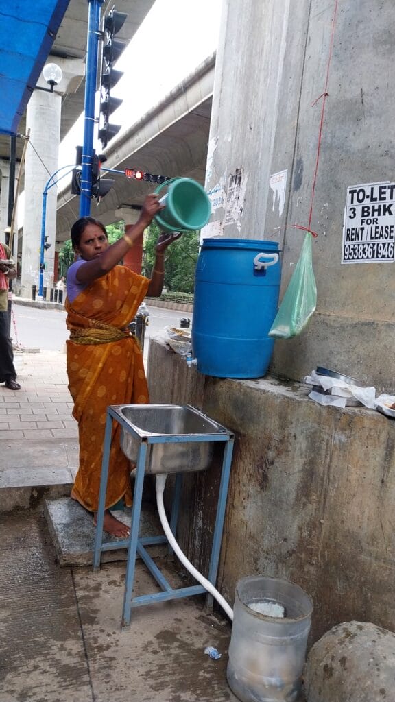 street vendor's wash basin on the footpath