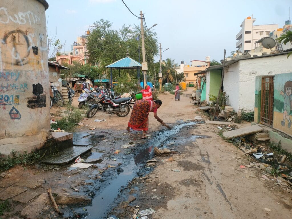 woman cleaning near borewell