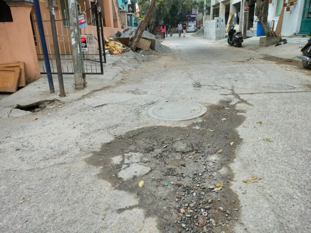 potholes on white-topped roads