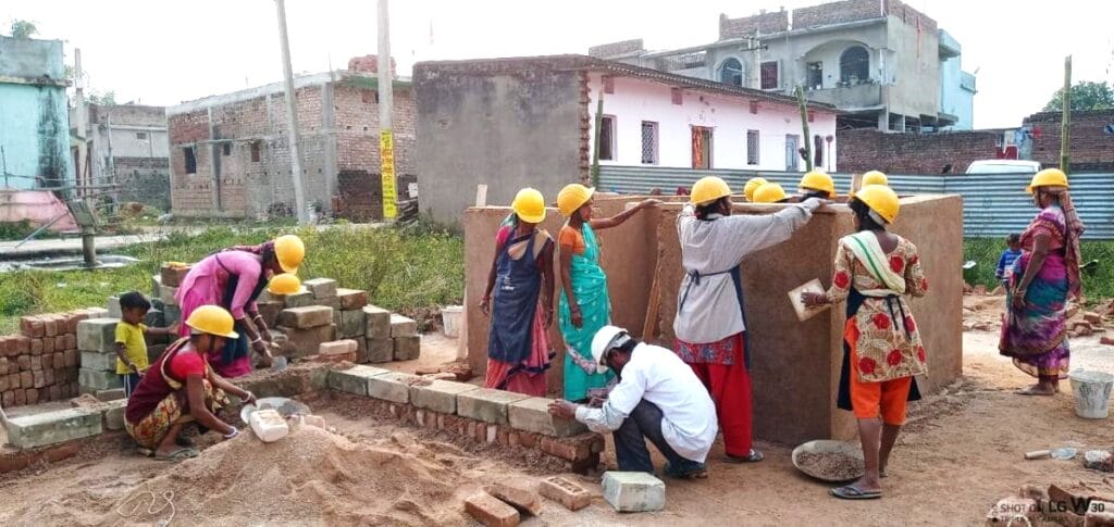 Construction workers working outdoors on a summer day.