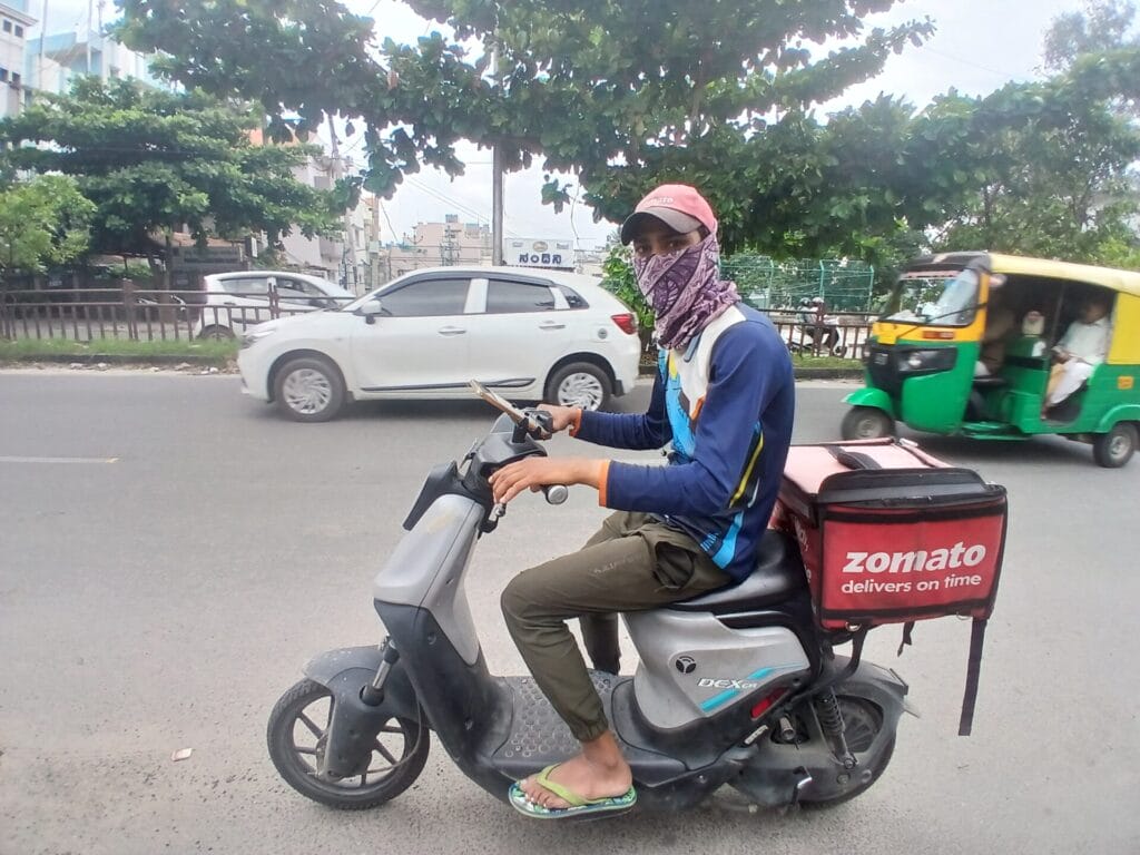 Man on bike delivering food in Bangalore