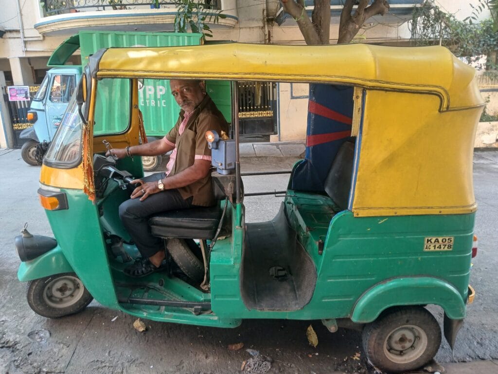 A man driving an auto