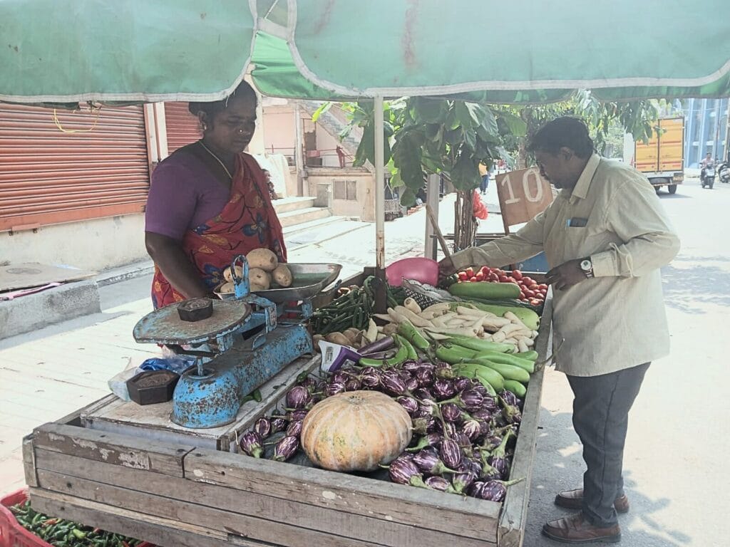 A woman selling vegetables