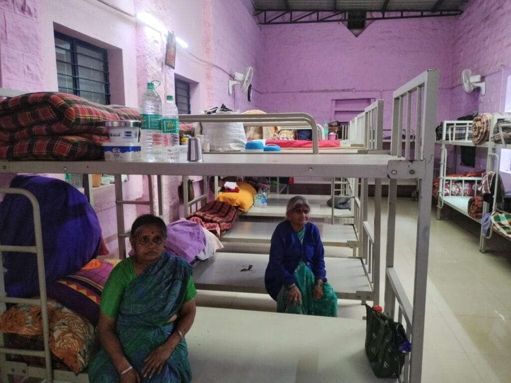 old women sitting on bed