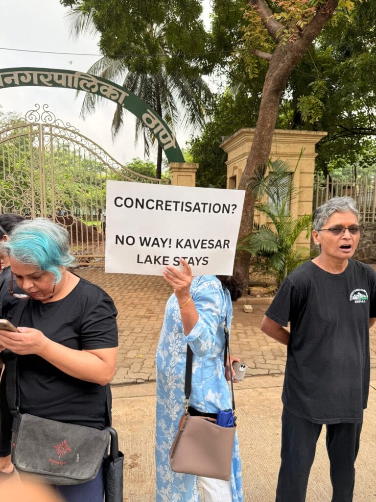 Citizens holding placards protesting concretisation in and around Kavesar Lake.