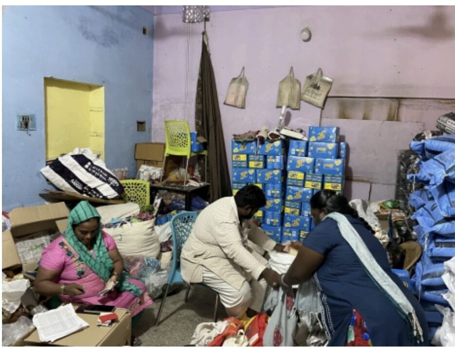 volunteers distribute food grains