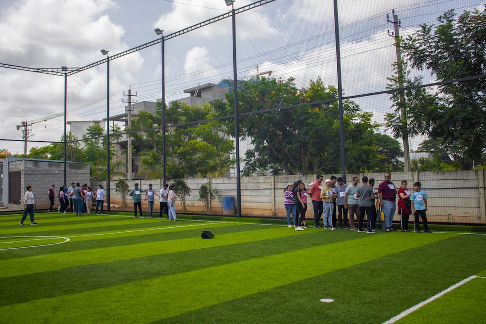 Players being guided into the field