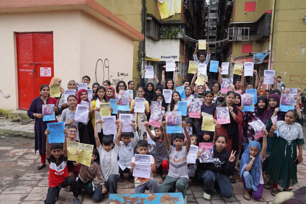 Young artists with their artwork in Govandi