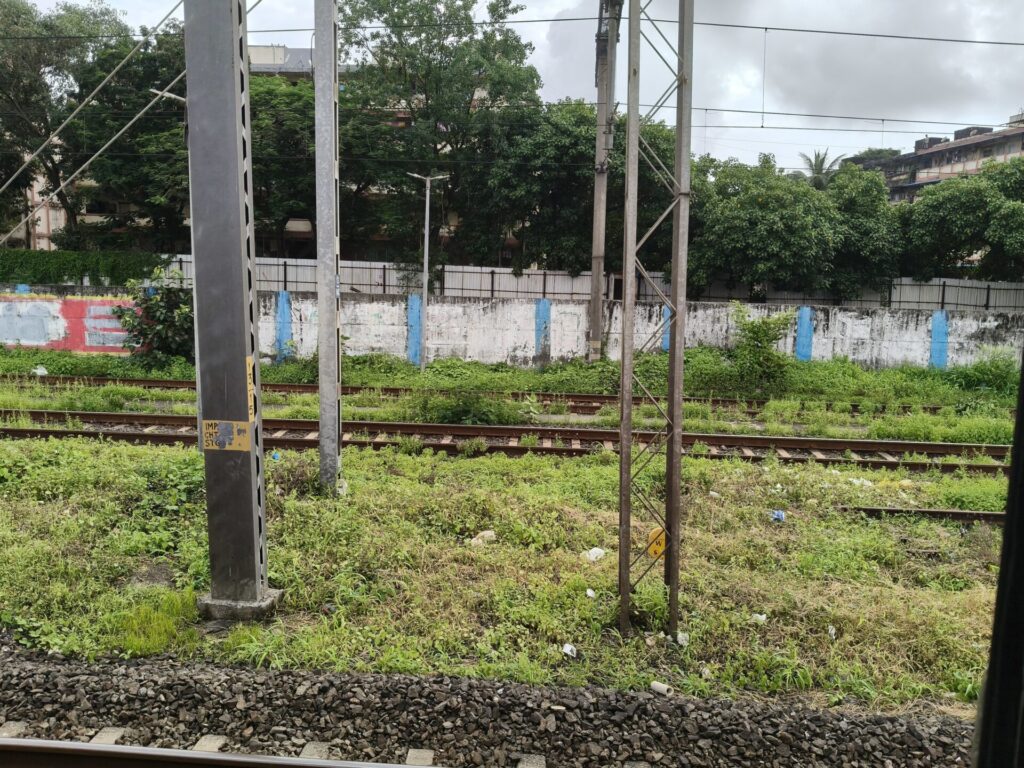 Compound wall built by railways along the track